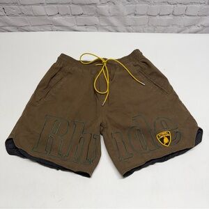Rhude Brown Shorts with Yellow Drawstring and Green Outline Logo